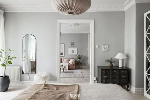 斯堪的纳维亚风情公寓 粉灰之魅与温馨家居的完美结合